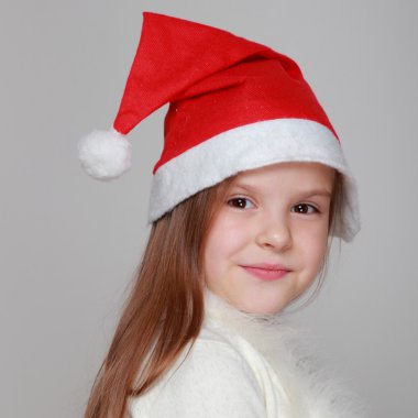 Mutlu gülen portresi Noel Baba şapkası, küçük kız