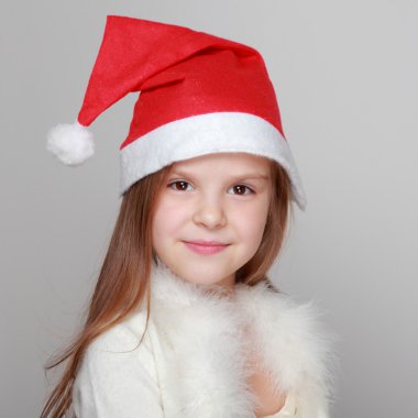 Mutlu gülen portresi Noel Baba şapkası, küçük kız