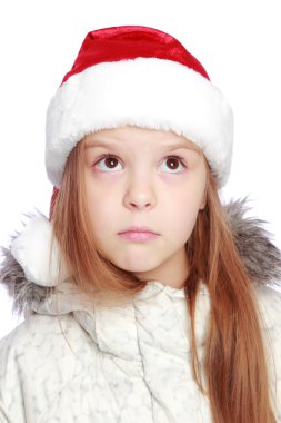 Bir Noel Baba'nın şapka neşeli bir kızla tatil portresi