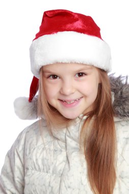 Bir Noel Baba'nın şapka neşeli bir kızla tatil portresi