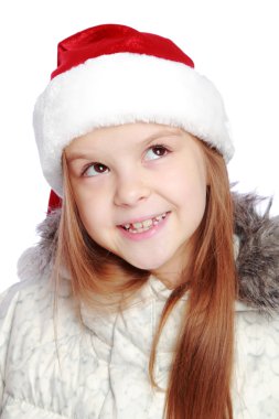 Bir Noel Baba'nın şapka neşeli bir kızla tatil portresi