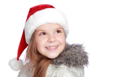 Bir Noel Baba'nın şapka neşeli bir kızla tatil portresi