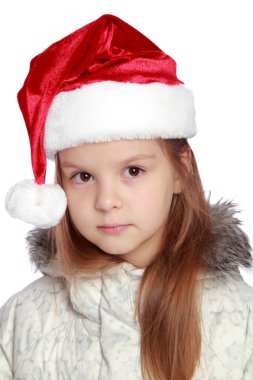 Bir Noel Baba'nın şapka neşeli bir kızla tatil portresi