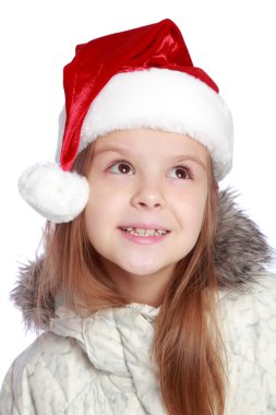 Bir Noel Baba'nın şapka neşeli bir kızla tatil portresi