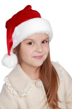 Noel Baba şapkası içinde güzel çocuk mutlu ve gülüyor