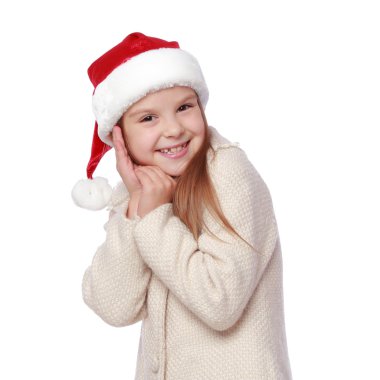 Noel Baba şapkası içinde güzel çocuk mutlu ve gülüyor