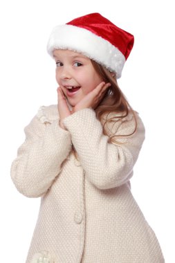 Noel Baba şapkası içinde güzel çocuk mutlu ve gülüyor