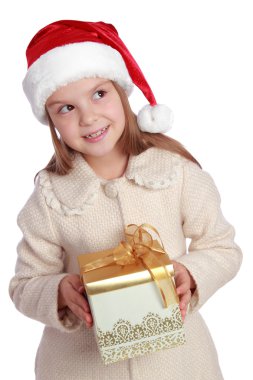 Noel Baba şapkası içinde güzel çocuk mutlu ve gülüyor