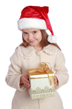 Noel Baba şapkası içinde güzel çocuk mutlu ve gülüyor