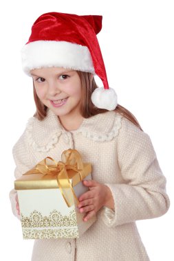 Noel Baba şapkası içinde güzel çocuk mutlu ve gülüyor