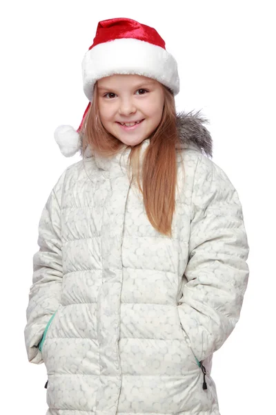 Retrato de uma menina alegre com chapéu de Papai Noel — Fotografia de Stock