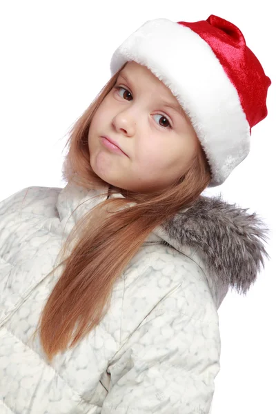 Portrait de vacances d'une fille joyeuse avec un chapeau de Père Noël — Photo