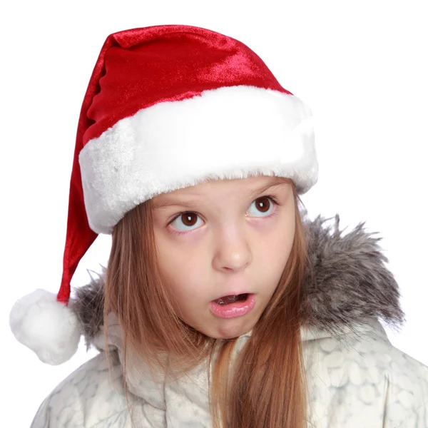 Portrait d'une fille joyeuse avec un chapeau de Père Noël — Photo