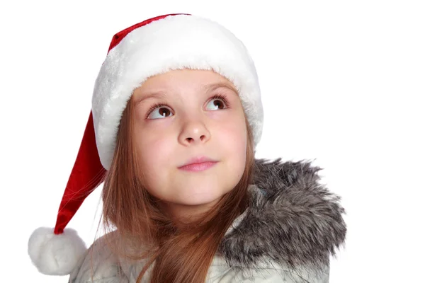 Retrato navideño de una chica alegre con sombrero de Santa — Foto de Stock
