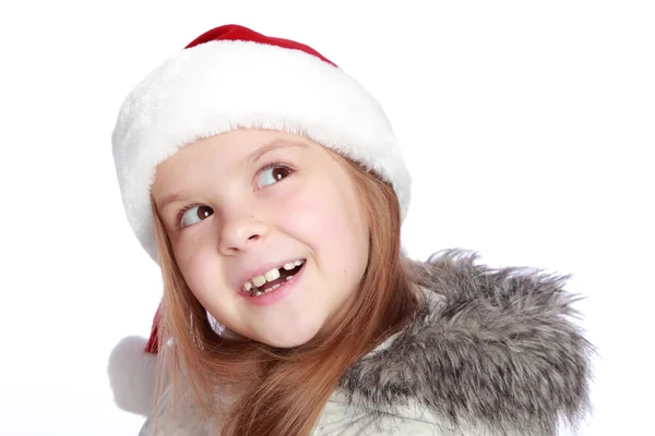 Portrait de vacances d'une fille joyeuse avec un chapeau de Père Noël — Photo