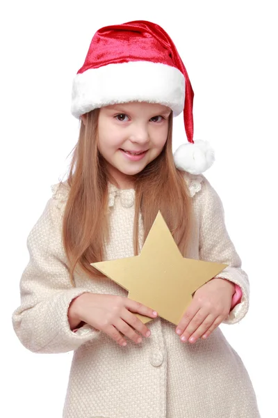 圣诞节的可爱的孩子，在圣诞老人的帽子的肖像 — 图库照片