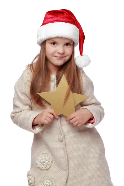 Christmas portrait of a cute child in a Santa's hat — Stock Photo, Image