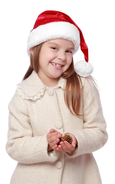 Bello bambino in un cappello di Babbo Natale è felice e ride — Foto Stock