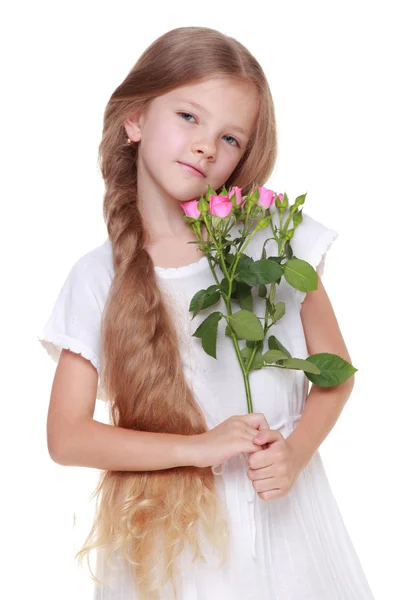 Enfant avec des fleurs — Photo