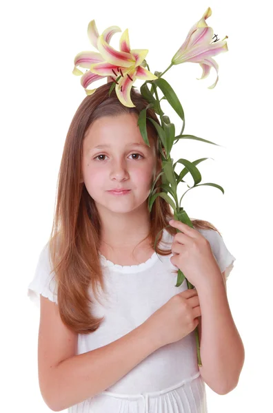 Mooi lachende meisje met een lelie — Stockfoto