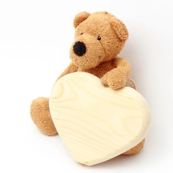 Toy bear and heart symbol — Stock Photo, Image