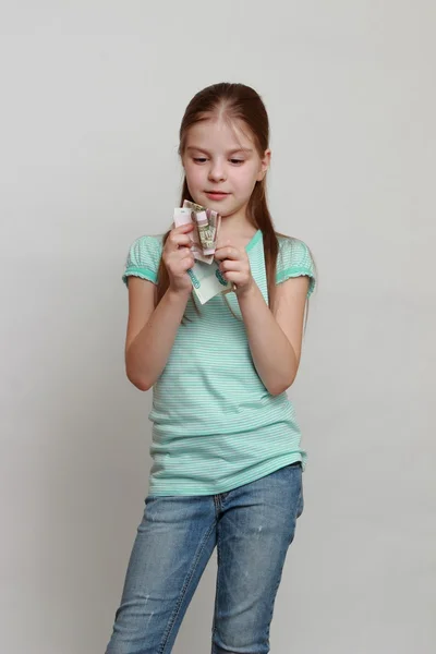 Kid and cash — Stock Photo, Image