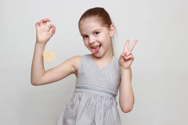 Kid holding Holiday symbol — Stock Photo, Image