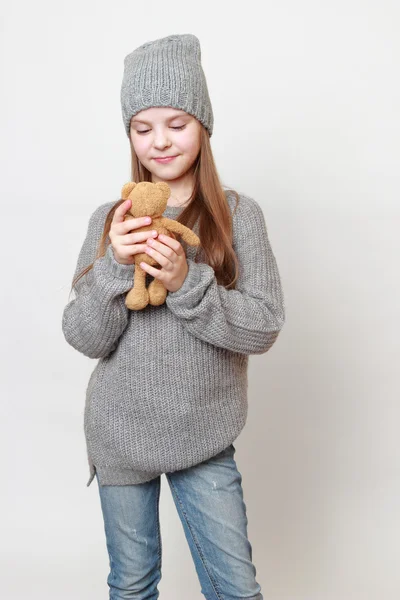 Kid holding toy bear — Stock Photo, Image