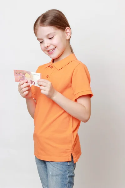 Kid and cash money — Stock Photo, Image