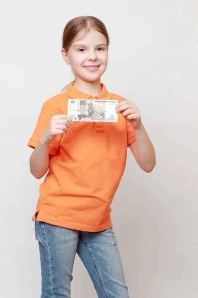 Niño y dinero en efectivo — Foto de Stock