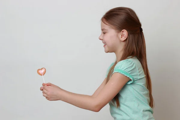 Kid holding sweet dessert — Stock Photo, Image