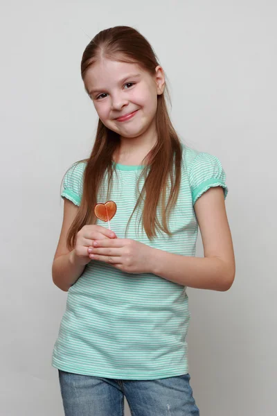 Kid holding sweet dessert — Stock Photo, Image