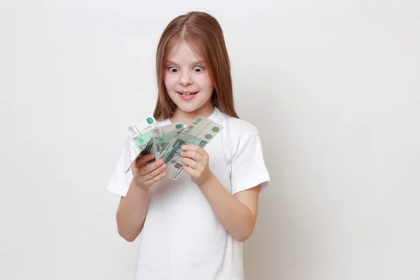 Kid and money — Stock Photo, Image