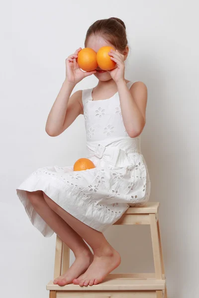 Kid holding eco orange — Stock Photo, Image