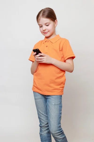 Dziecko i telefon komórkowy — Zdjęcie stockowe