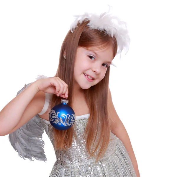 Nice portrait of cheerful lovely girl as an angel with Christmas decorative ball — Stock fotografie