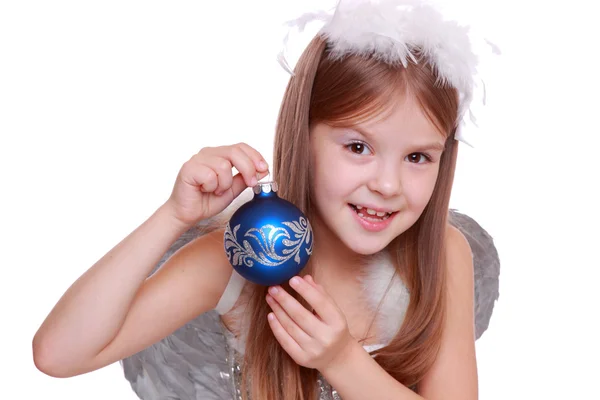 Nice portrait of cheerful lovely girl as an angel with Christmas decorative ball — Stockfoto