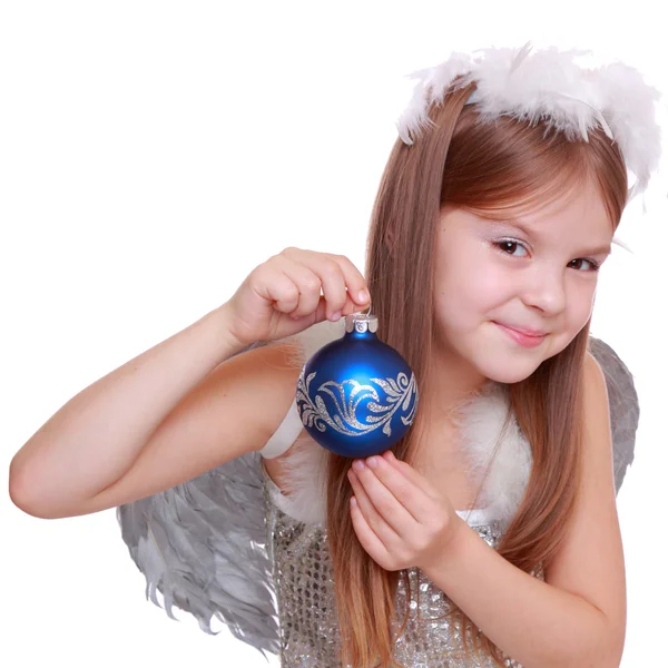 Nice portrait of cheerful lovely girl as an angel with Christmas decorative ball — ストック写真