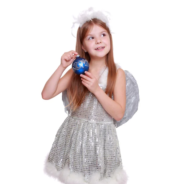 Nice portrait of cheerful lovely girl as an angel with Christmas decorative ball — Zdjęcie stockowe