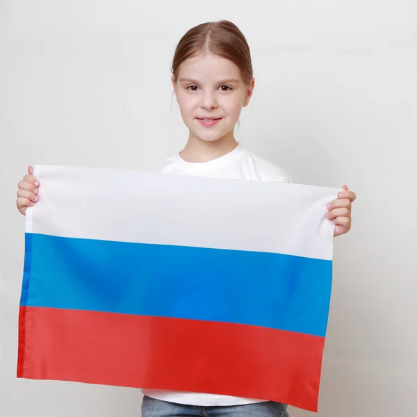 Kid a symbolem vlajka — Stock fotografie