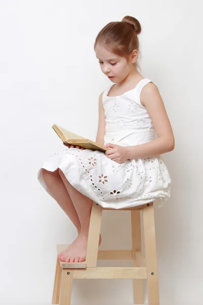 Kid and book — Stock Photo, Image