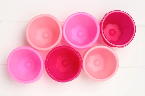 Pink tins for baking muffins — Stock Photo, Image