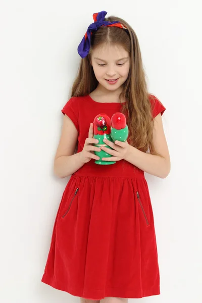 Kid holding matryoshka doll — Stock Photo, Image