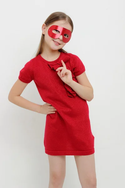 Little girl and carnival mask — Stock Photo, Image