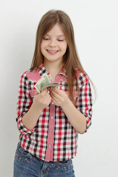 Teen girl and dollars — Stock Photo, Image