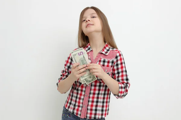 Teen girl and dollars — Stock Photo, Image