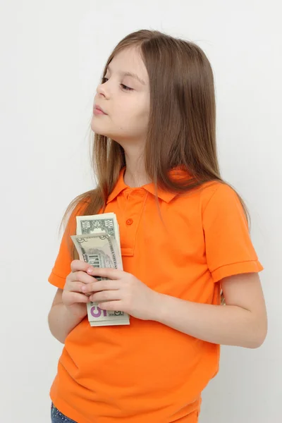Sonriente niña y dinero — Foto de Stock