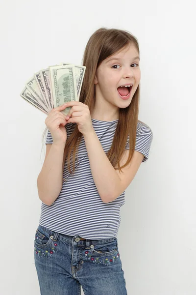 Little girl and dollars — Stock Photo, Image