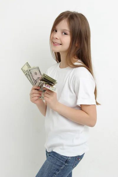 Bambina e dollari — Foto Stock