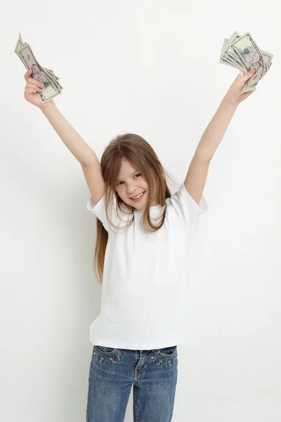 Criança e dinheiro em dinheiro — Fotografia de Stock